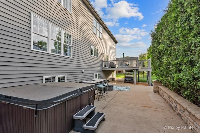 9 Laurel Valley Ct, Lake In The Hills, IL 60156 - view of patio / terrace featuring a hot tub and a deck