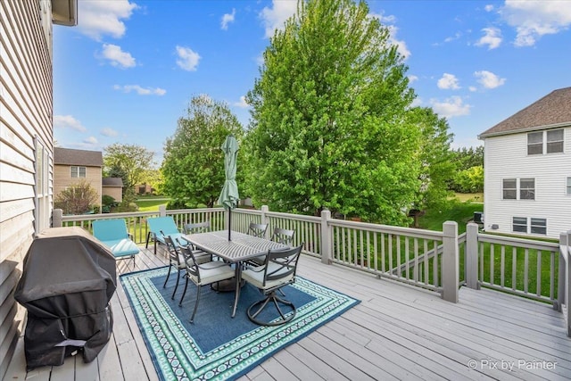 9 Laurel Valley Ct, Lake In The Hills, IL 60156 - wooden deck featuring outdoor dining area and a grill