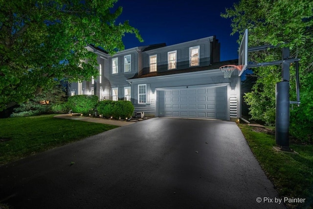 9 Laurel Valley Ct, Lake In The Hills, IL 60156 - view of front of home with driveway, a lawn, and a garage