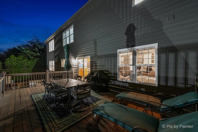 9 Laurel Valley Ct, Lake In The Hills, IL 60156 - deck at twilight with outdoor dining area