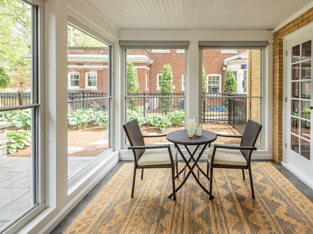 sunroom / solarium with wood ceiling
