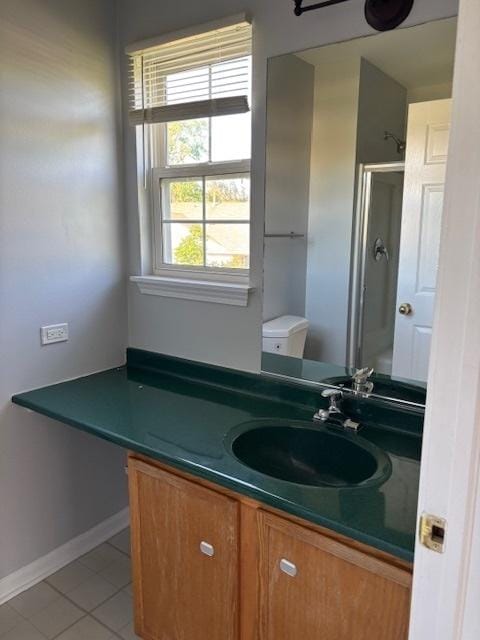 1286 N Red Oak Cir Unit 4, Round Lake Beach, IL 60073 - full bathroom with tile patterned flooring, vanity, a shower, and baseboards