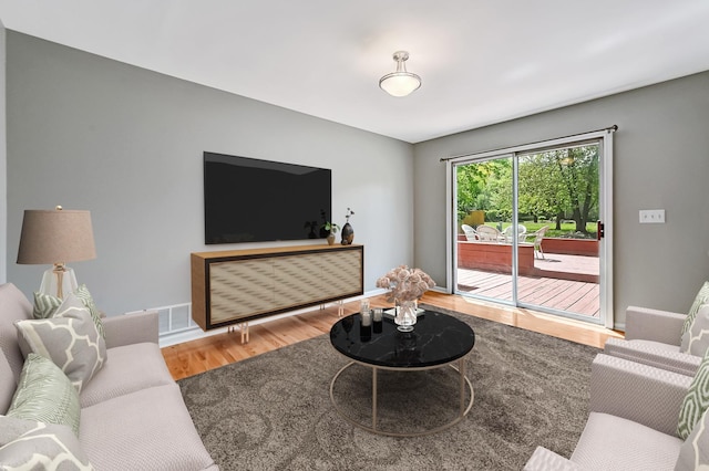 1400 Carleton Ave, Naperville, IL 60565 - living area featuring wood finished floors and baseboards