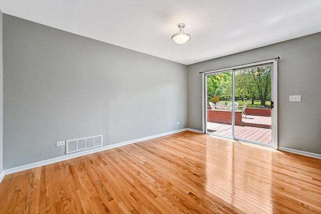 1400 Carleton Ave, Naperville, IL 60565 - unfurnished room with wood finished floors and baseboards