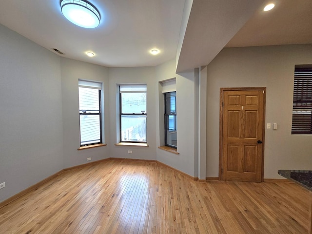 6137 S Kimbark Ave Unit 1, Chicago, IL 60637 - empty room featuring light wood-style floors, baseboards, and recessed lighting