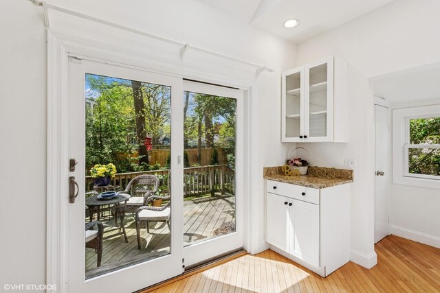 1022 Elmwood Ave, Evanston, IL 60202 - doorway to outside with light wood-type flooring and baseboards
