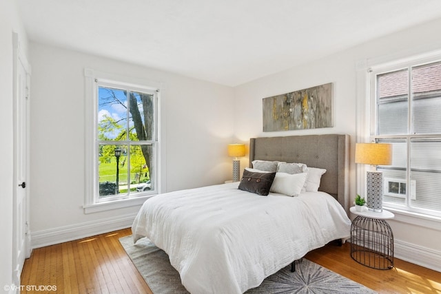1022 Elmwood Ave, Evanston, IL 60202 - bedroom with wood-type flooring and baseboards