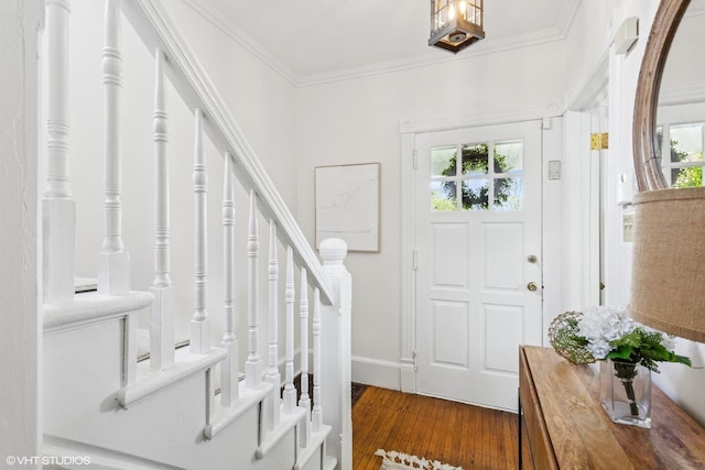 1022 Elmwood Ave, Evanston, IL 60202 - entrance foyer with healthy amount of natural light, wood finished floors, crown molding, and baseboards