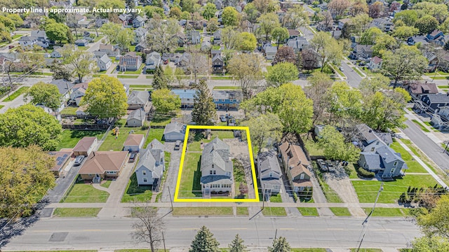 aerial perspective of suburban area featuring property parcel outlined