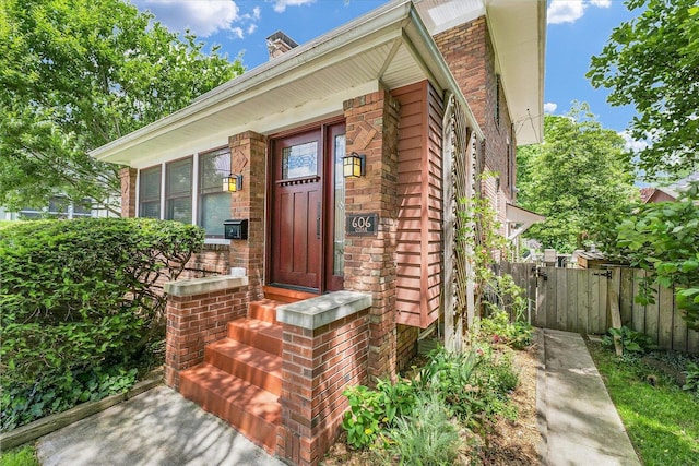 606 S Cedar St, Urbana, IL 61801 - entrance to property with brick siding and a chimney