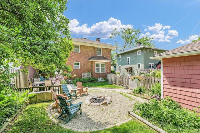 606 S Cedar St, Urbana, IL 61801 - view of yard with an outdoor fire pit