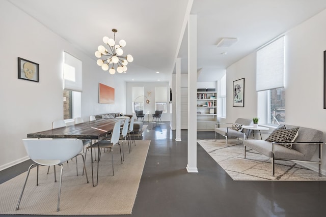 956 W 18th Pl, Chicago, IL 60608 - dining area featuring finished concrete floors, healthy amount of natural light, and baseboards
