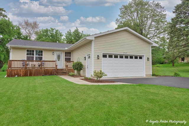 2505 S Harriet Ln, Holiday Hills, IL 60051 - ranch-style house with driveway, a front yard, and a garage