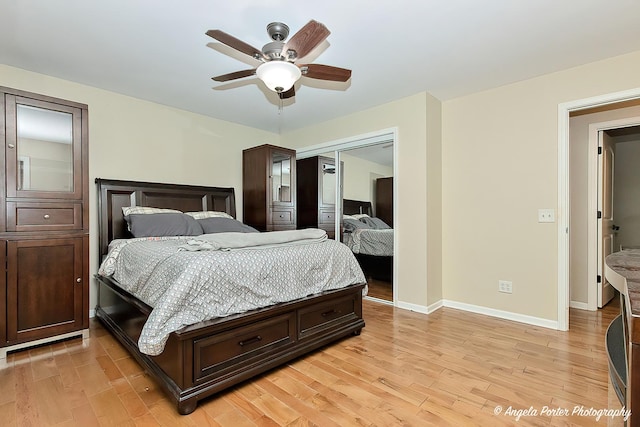 2505 S Harriet Ln, Holiday Hills, IL 60051 - bedroom with a closet, light wood finished floors, baseboards, and ceiling fan