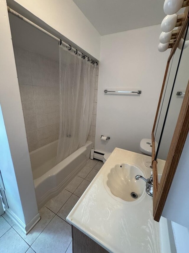 4456 W Gunnison St Unit 2A, Chicago, IL 60630 - full bathroom with tile patterned flooring, a baseboard radiator, shower / tub combo with curtain, and vanity