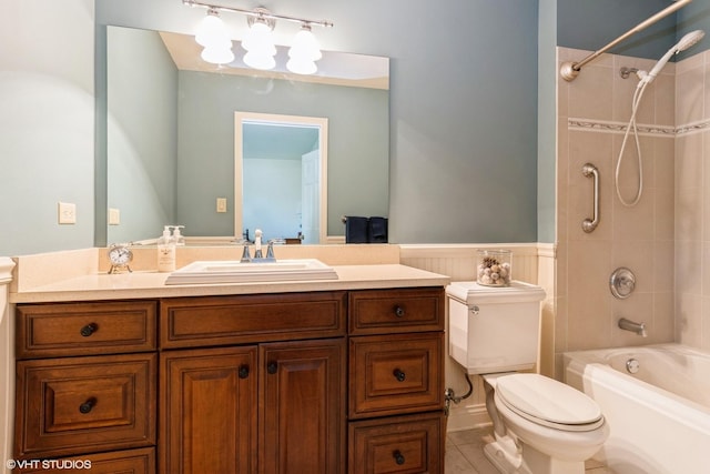 14642 S Pebble Creek Dr, Homer Glen, IL 60491 - full bath featuring toilet, shower / bathtub combination, vanity, tile patterned flooring, and wainscoting
