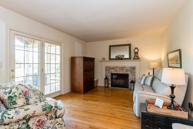 14642 S Pebble Creek Dr, Homer Glen, IL 60491 - living room with light wood-style flooring and a fireplace
