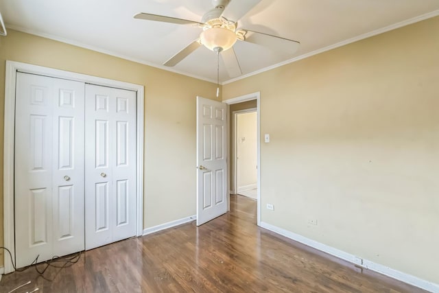 12817 S Racine Ave, Calumet Park, IL 60827 - unfurnished bedroom featuring wood finished floors, a closet, baseboards, and crown molding
