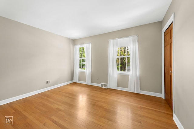 1532 Chat Ct, Naperville, IL 60565 - unfurnished room with light wood-style floors and baseboards