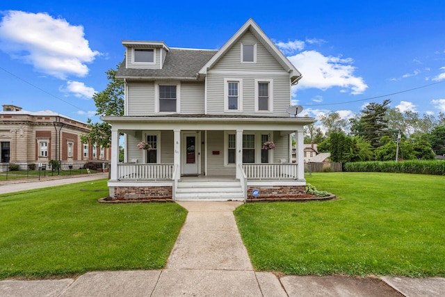 201 E Court St, Paris, IL 61944 - view of front of property with a front lawn, a shingled roof, and covered porch