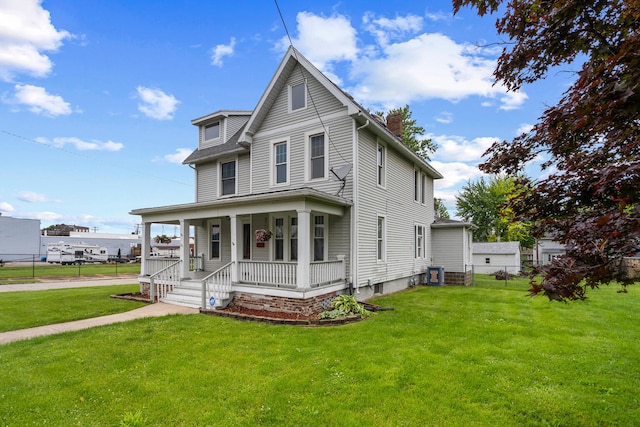 201 E Court St, Paris, IL 61944 - view of front of property featuring covered porch, a chimney, and central air condition unit