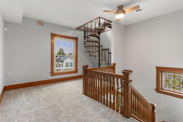 201 E Court St, Paris, IL 61944 - staircase with carpet, baseboards, and a ceiling fan