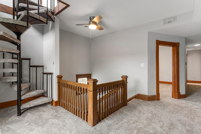 201 E Court St, Paris, IL 61944 - stairs featuring carpet flooring, baseboards, and ceiling fan