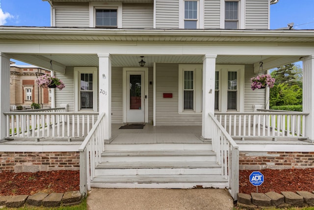201 E Court St, Paris, IL 61944 - property entrance with a porch
