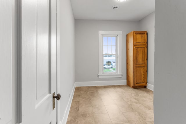 201 E Court St, Paris, IL 61944 - unfurnished room with baseboards