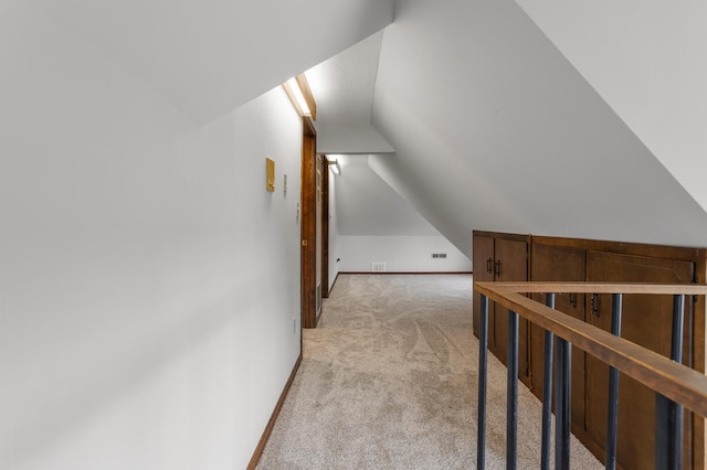 201 E Court St, Paris, IL 61944 - hallway with light colored carpet and lofted ceiling