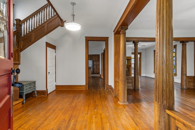 201 E Court St, Paris, IL 61944 - entryway with decorative columns, light wood finished floors, and baseboards