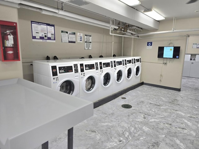 4800 S Chicago Beach Dr Unit 1211N, Chicago, IL 60615 - community laundry room featuring independent washer and dryer and baseboards