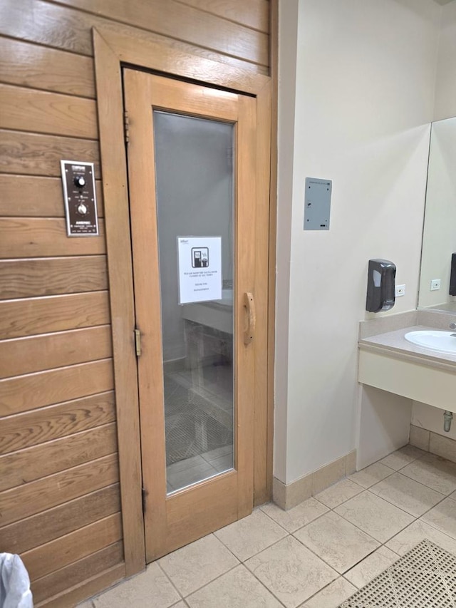 4800 S Chicago Beach Dr Unit 1211N, Chicago, IL 60615 - bathroom with tile patterned floors, baseboards, and a sink