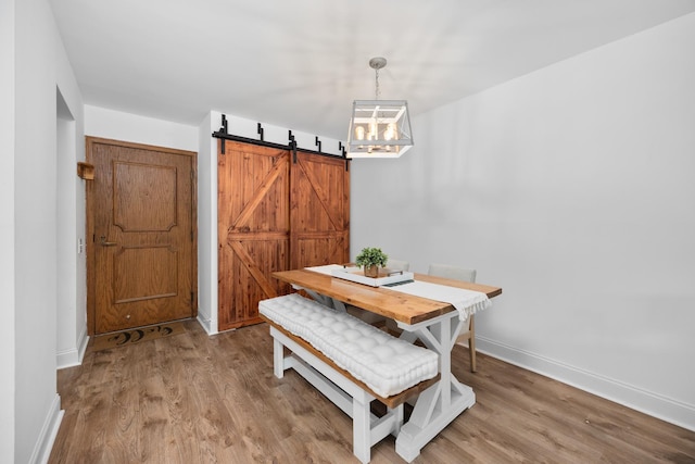 540 Biesterfield Rd Unit 104A, Elk Grove Village, IL 60007 - dining room with wood finished floors, a chandelier, and baseboards
