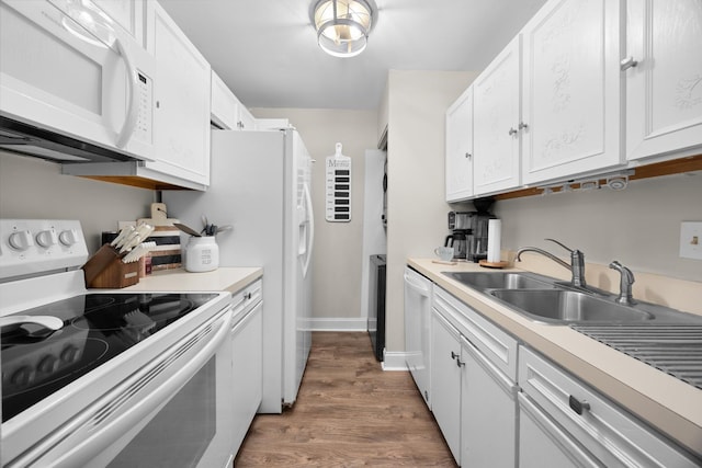 540 Biesterfield Rd Unit 104A, Elk Grove Village, IL 60007 - kitchen featuring white appliances, a sink, white cabinets, wood finished floors, and light countertops