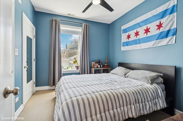 2217 W Foster Ave Unit 1, Chicago, IL 60625 - carpeted bedroom with baseboards and a ceiling fan