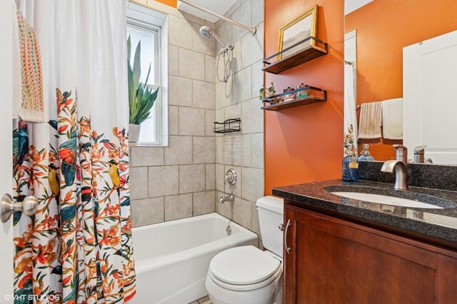 2217 W Foster Ave Unit 1, Chicago, IL 60625 - full bathroom featuring toilet, plenty of natural light, vanity, and shower / bath combo