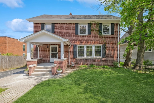 1557 Green Bay Rd, Highland Park, IL 60035 - traditional style home with brick siding and a porch