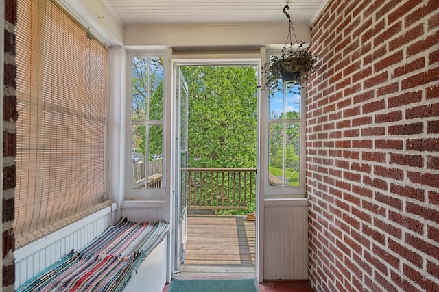 1557 Green Bay Rd, Highland Park, IL 60035 - doorway with brick wall and crown molding