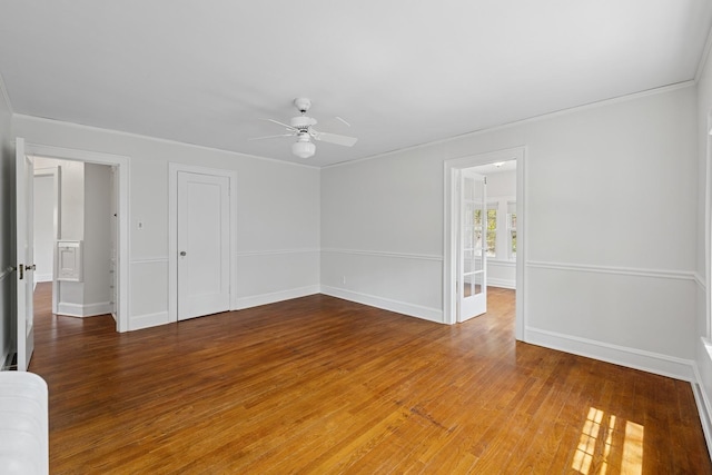 1557 Green Bay Rd, Highland Park, IL 60035 - unfurnished room featuring ceiling fan, light wood-type flooring, baseboards, and crown molding
