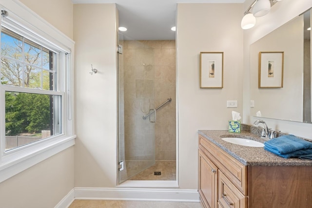 1557 Green Bay Rd, Highland Park, IL 60035 - bathroom with baseboards, a shower stall, and healthy amount of natural light