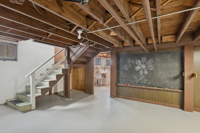 1557 Green Bay Rd, Highland Park, IL 60035 - unfinished below grade area featuring stairway and washer and dryer