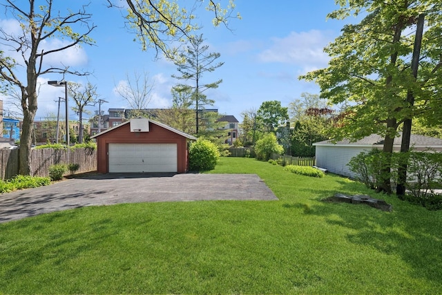 1557 Green Bay Rd, Highland Park, IL 60035 - view of yard with an outdoor structure and a detached garage