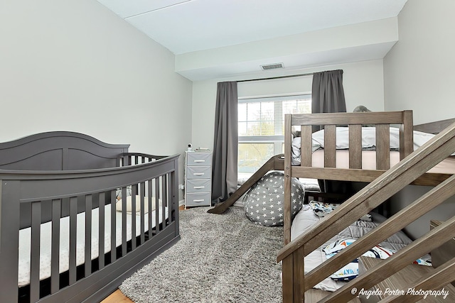 390 W Mahogany Ct Unit 301, Palatine, IL 60067 - carpeted bedroom featuring baseboards