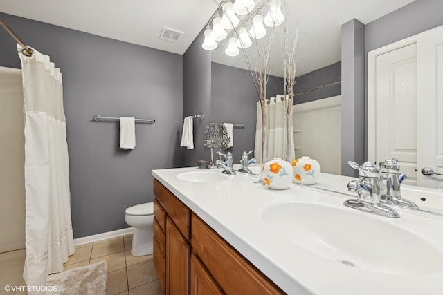 15130 Laurel Ln, Lockport, IL 60441 - full bathroom featuring toilet, tile patterned flooring, baseboards, and double vanity
