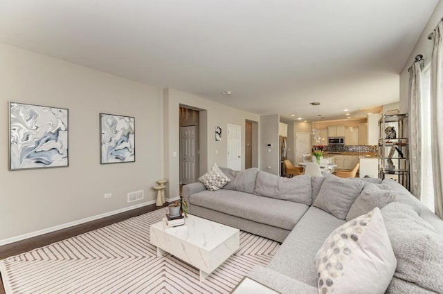 141 Bluegrass Pkwy, Oswego, IL 60543 - living area featuring baseboards and recessed lighting