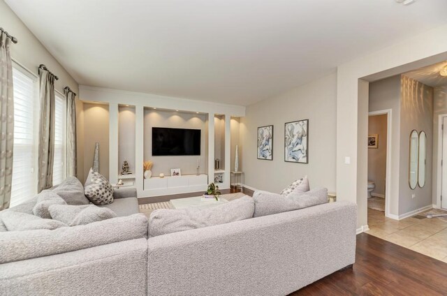 141 Bluegrass Pkwy, Oswego, IL 60543 - living area featuring wood finished floors