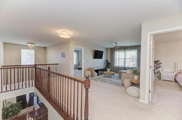 141 Bluegrass Pkwy, Oswego, IL 60543 - hall with carpet and an upstairs landing
