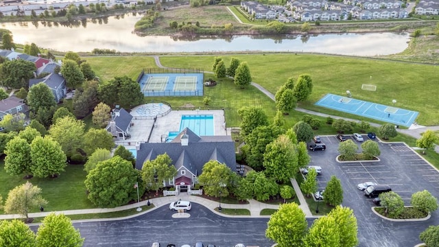 141 Bluegrass Pkwy, Oswego, IL 60543 - aerial view of property and surrounding area featuring a large body of water and a pool area