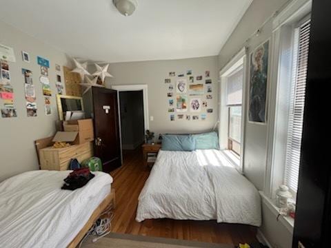 5110 S Woodlawn Ave Unit 3H, Chicago, IL 60615 - bedroom with wood finished floors